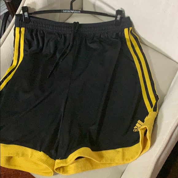 adidas black shorts with yellow stripes